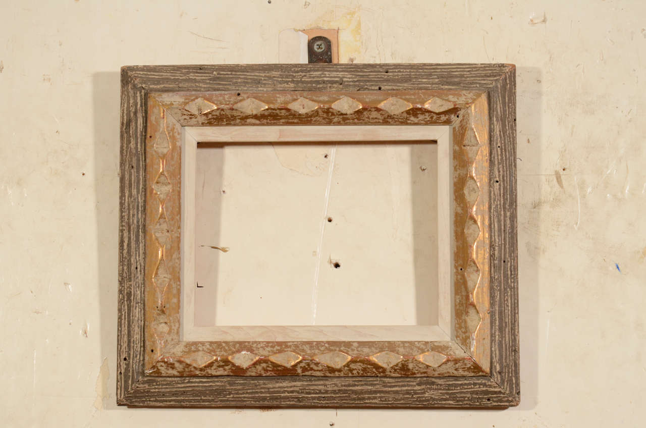 Charming small frame with a sophisticated surface and original patina. 
Exterior dimensions: 10 5/8 x 12 3/8 inches
Rabbet dimensions: 6 3/8 x 8 1/8 inches
Moulding width: 2 1/2 inches