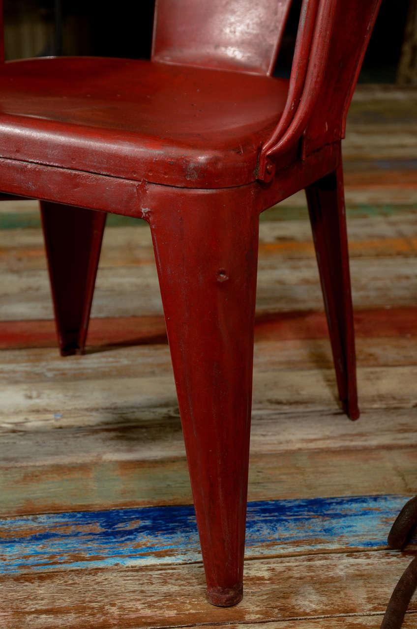 French Red Tolix Chairs set of 4 In Distressed Condition For Sale In New York, NY