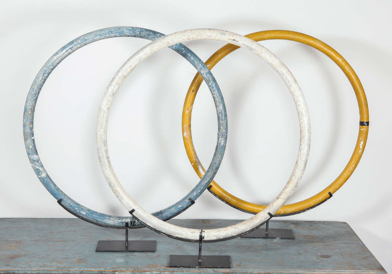 Sold individually, these vintage circus hoops sit handsomely on custom metal stands. 

*Note*: White circus ring is no longer available.
