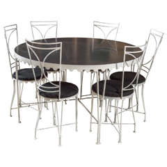 Attributed to Gilbert Poillerat Table and Chair Set