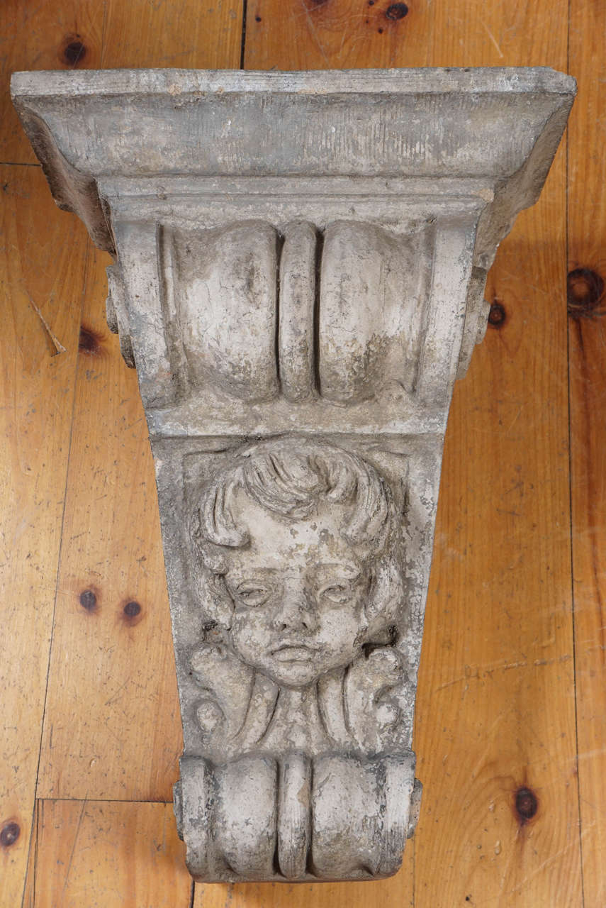 Stoneware Corbel with Putti Mask, New York City