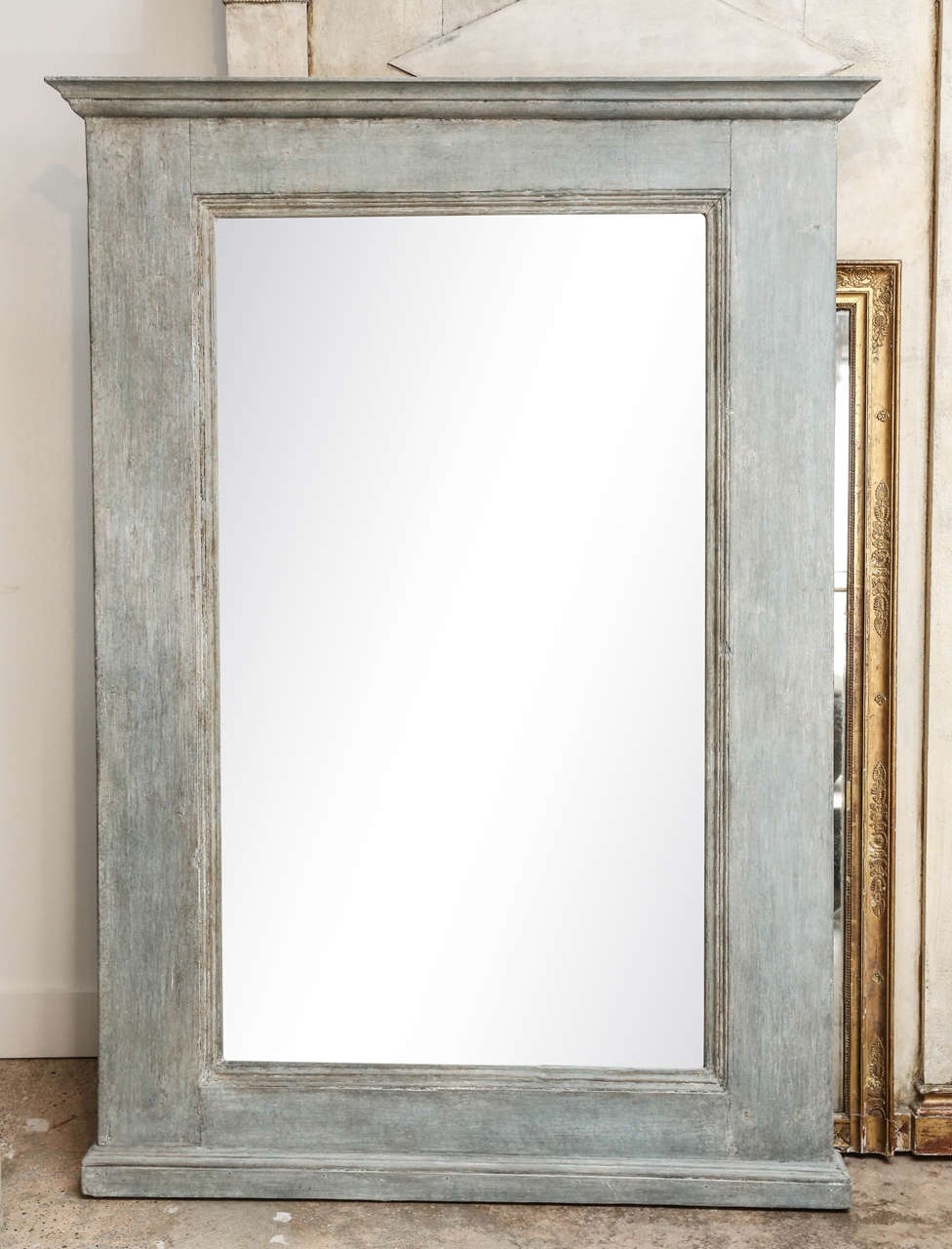 Large painted 19th century French frame with later mirror.