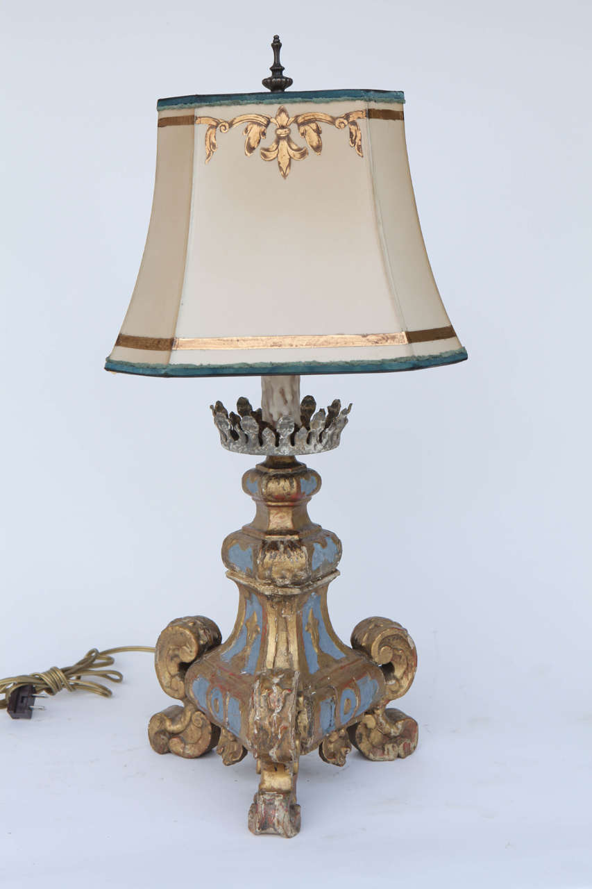 Pair of early 19th c.Italian Carved Giltwood and Painted Candle Fragments converted to Lamps. The Shades are included and are Hand Made of Parchment Paper. They are Hand Gilded and Decorated. The lamps have been newly wired.