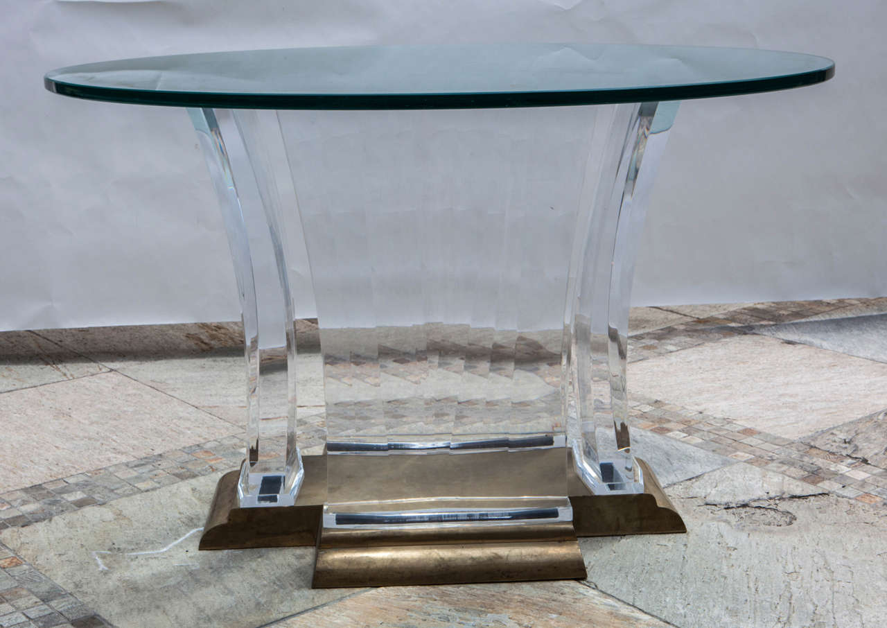 Stunning Midcentury bronze and Lucite base pedestal table. The glass top measures 48 in. The base consists of five pieces:
Bronze base.
Four Lucite pieces.

The height measurement below is without the glass.