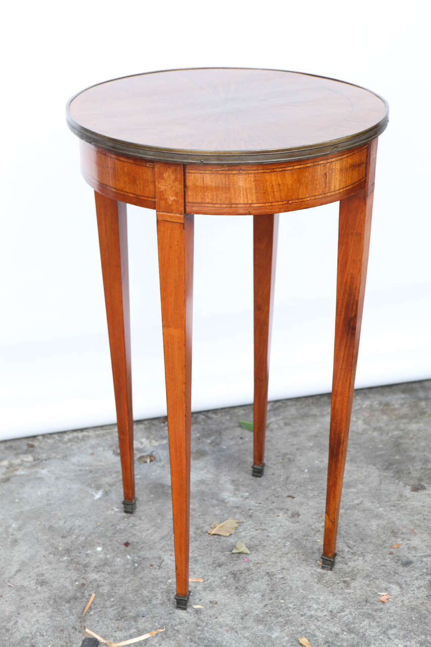 1900's French Mahogany Occasional Table with Bronze Rim and inlaid with Star Motif.