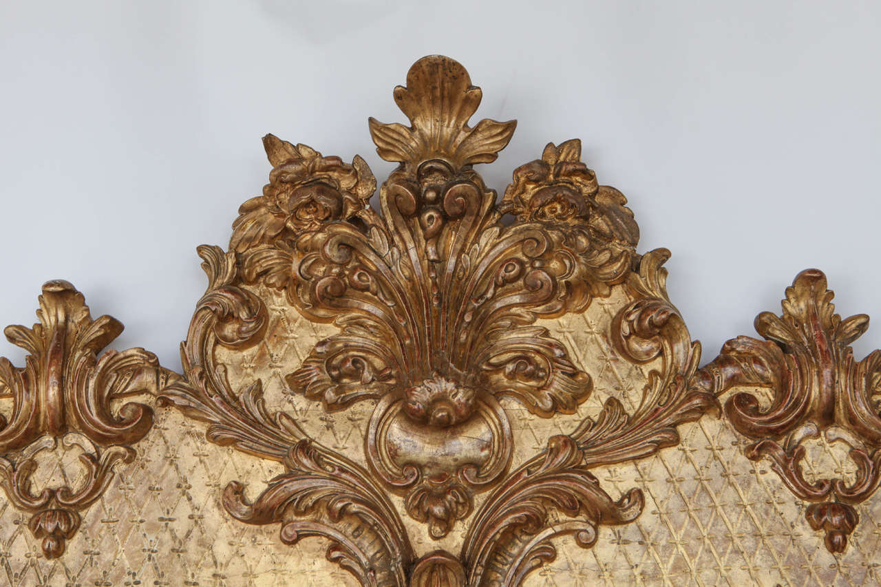 Giltwood 19th Century French Carved and Gilded Mirror with Crested Top For Sale