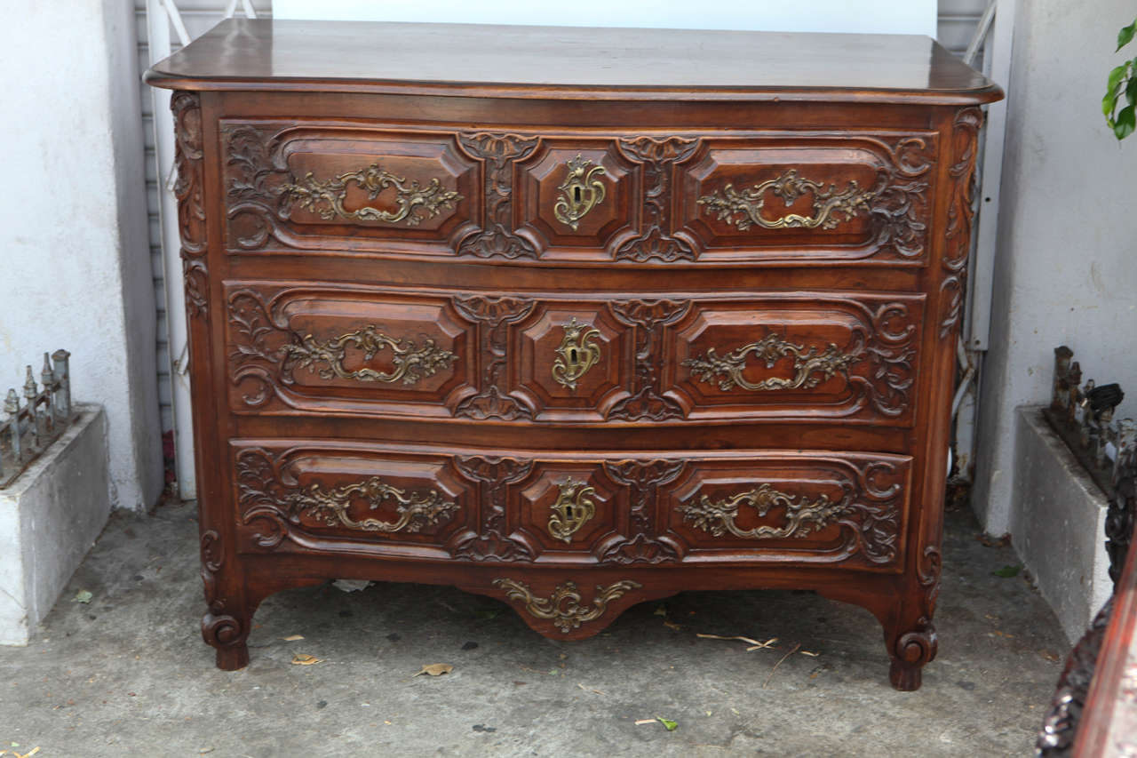 18th c. French Louis XV Style carved 3 Drawer Walnut Commode with Bronze Hardware.  Lyon, France.