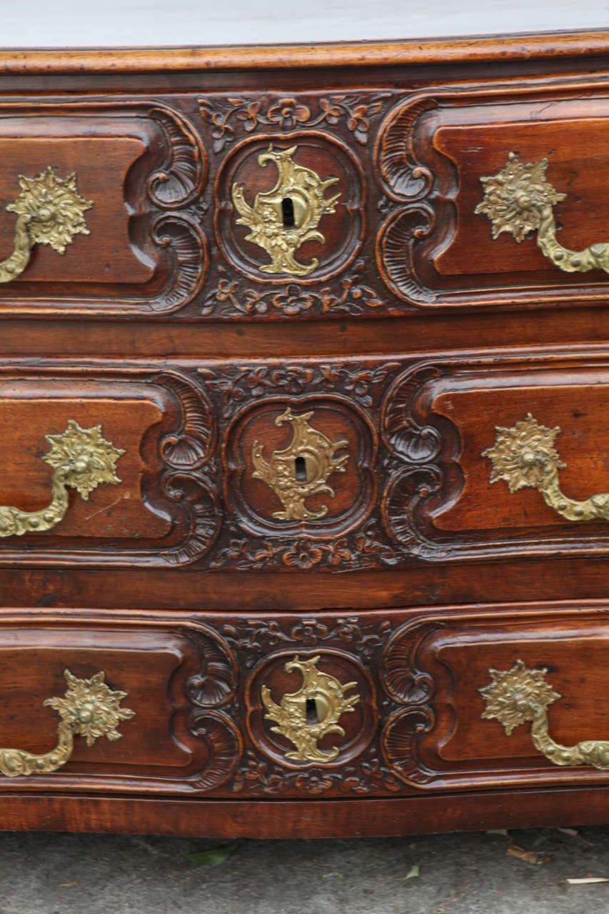 Carved 18th Century French Louis XV Style Walnut Commode For Sale
