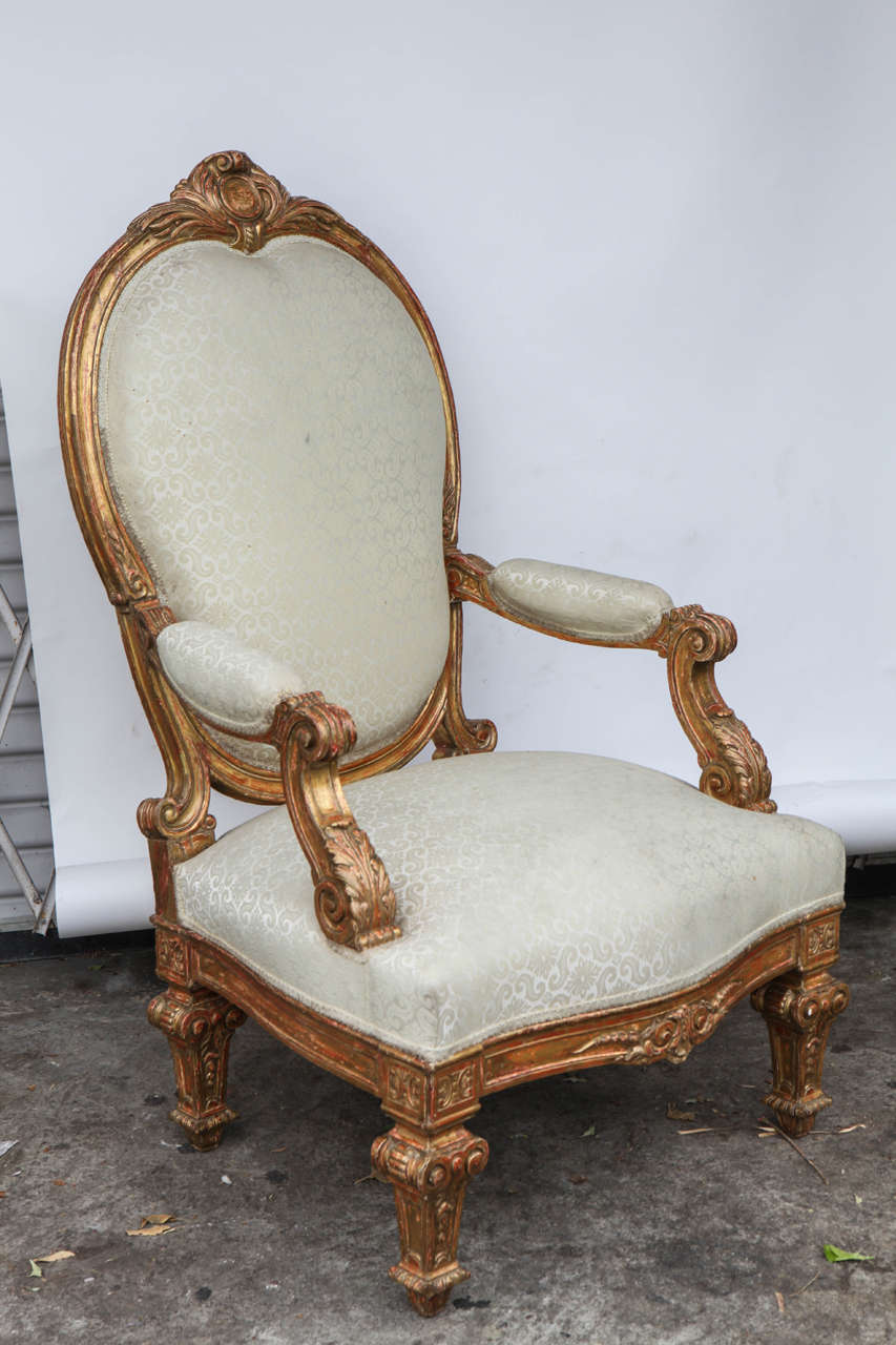 Pair of 19th century Italian giltwood oversized balloon back armchairs. These chairs have been recovered. These chairs are sold in pairs. The price below is per each chair. The total for the pair is $19,000.00