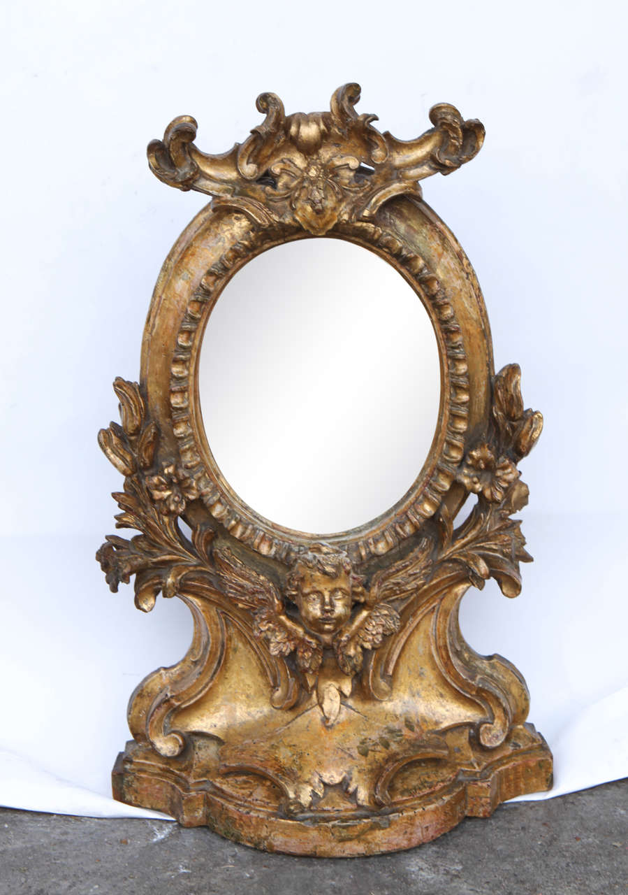 19th c. Italian Carved Giltwood Mirror with Cherub Head Motif