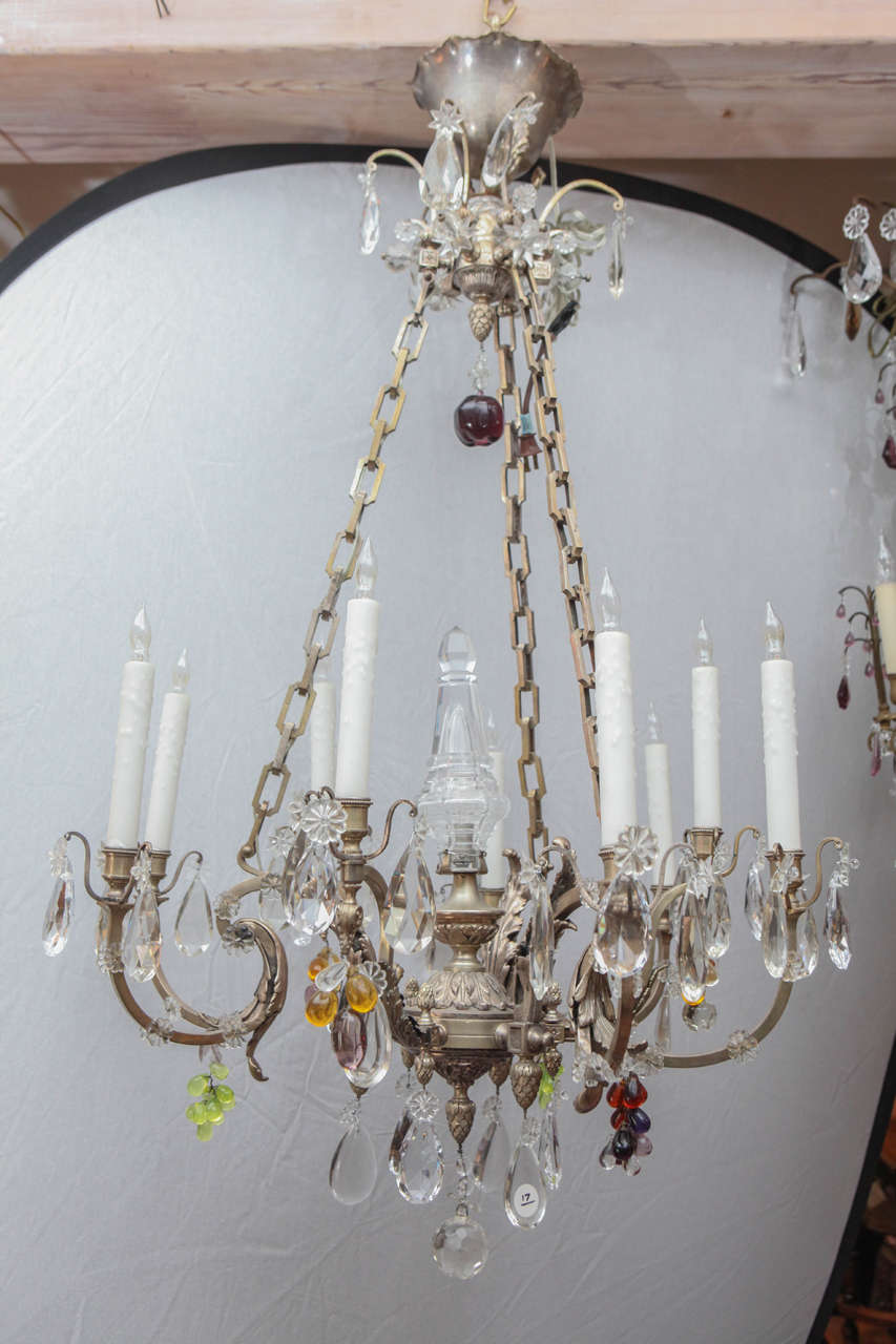 1900s French silvered bronze eight-light chandelier with cut crystal and hanging grapes. Newly wired.