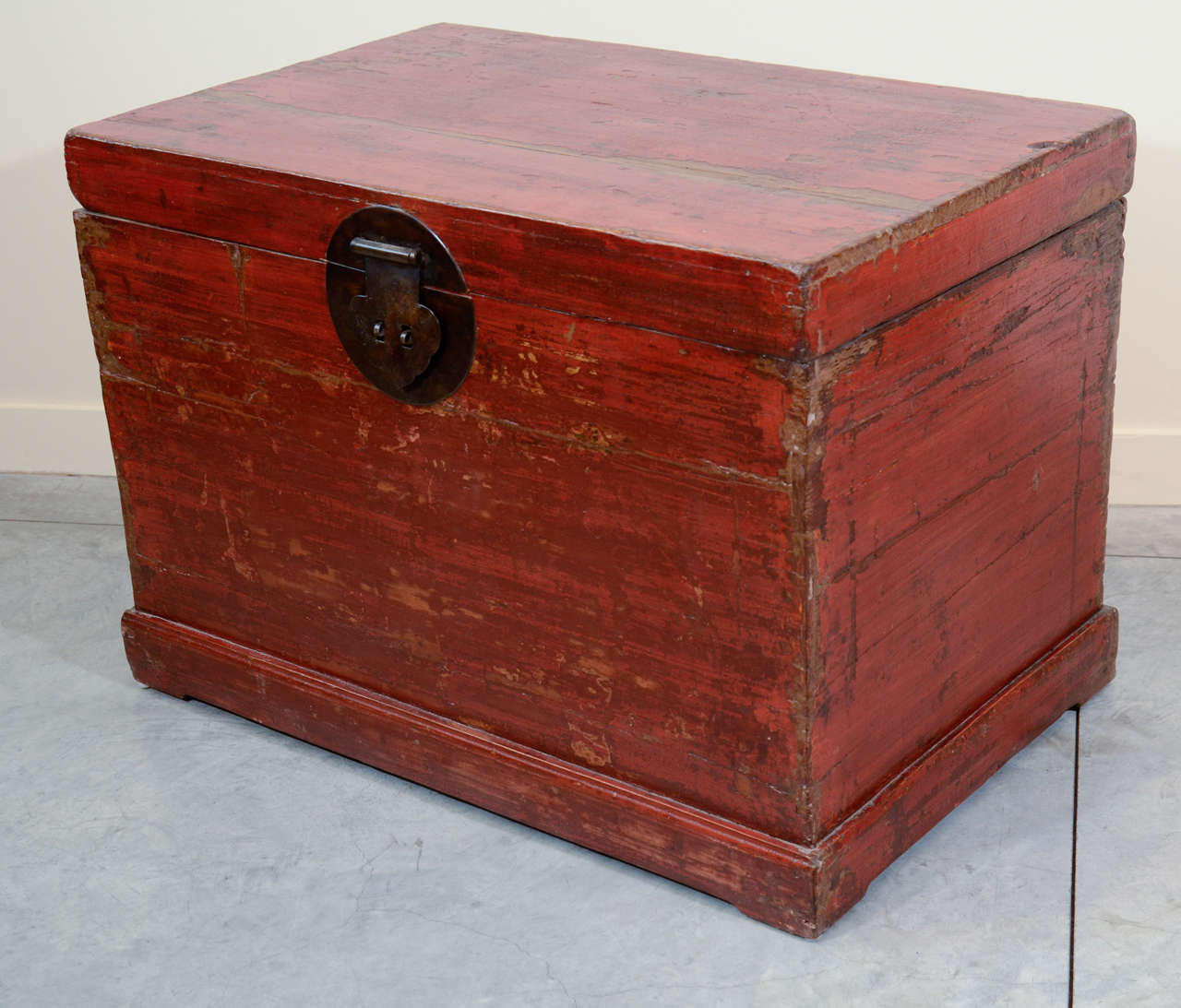 A nicely worn red elm Chinese clothing trunk, circa 1880, from Shanxi Province.

