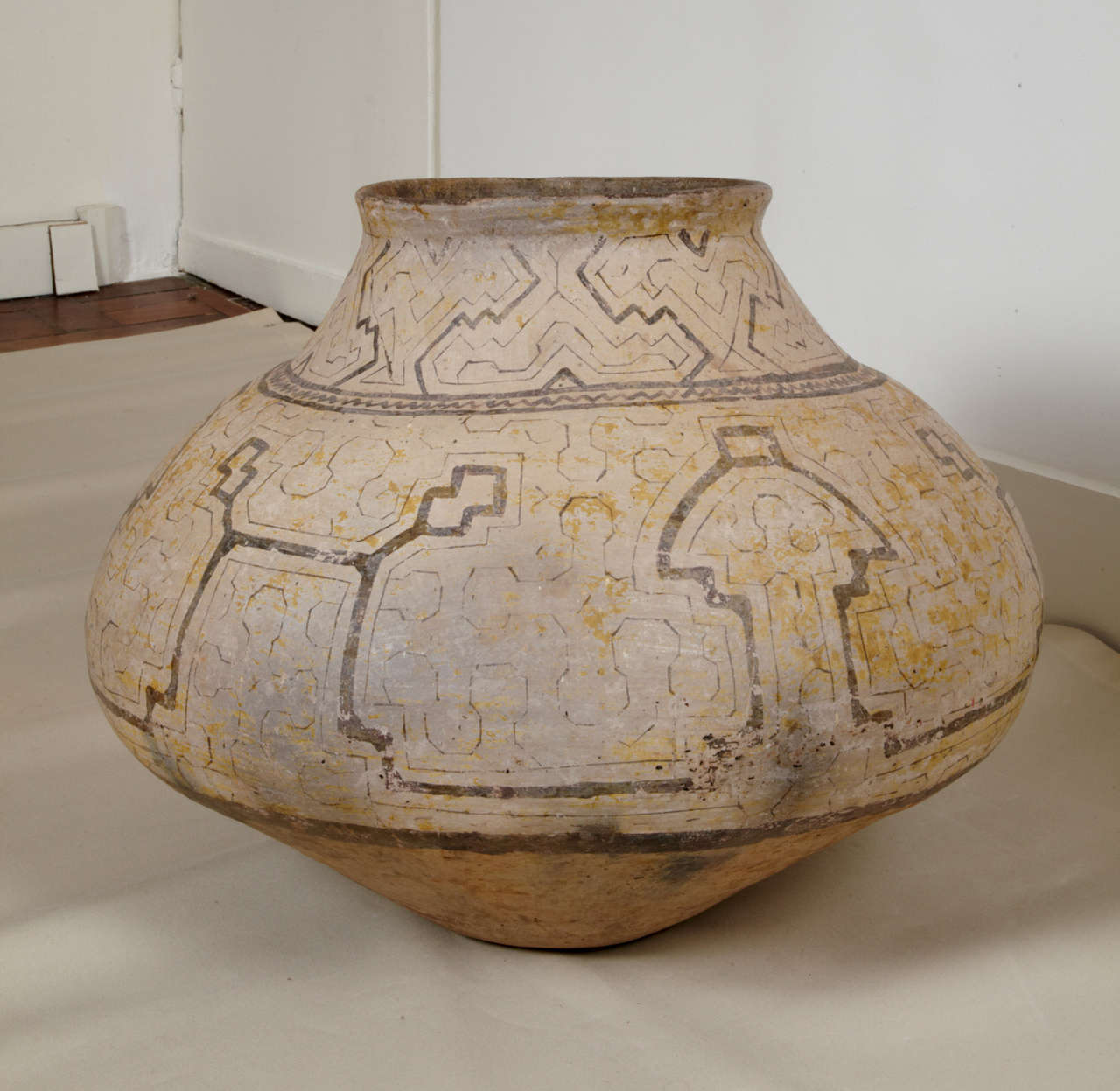 Very large antique Shipibo figural vessel, circa 1900-1930, Culture Peruvian Amazon. Natural pigments and bold, unique, geometric design. This vessel was produced to contain beverages. The bowl would be settled in the earth up to its widest point to