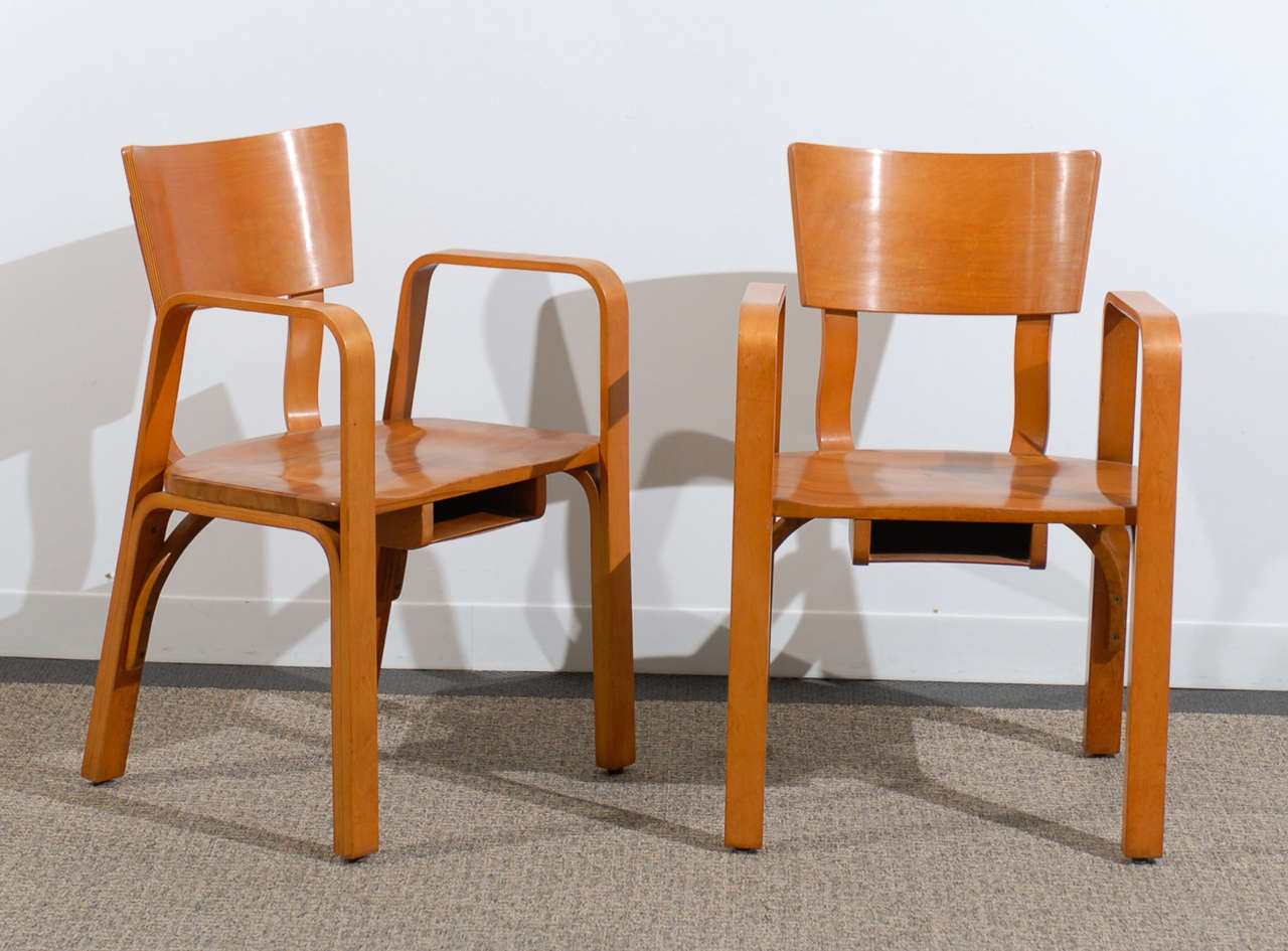 Wood An Unusual Pair of Bent Plywood Arm Chairs by Thonet