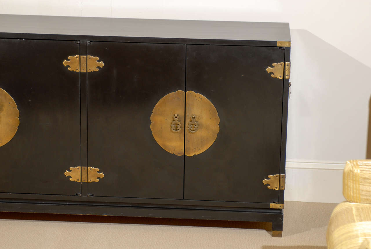 A high impact piece that offers function and versatility.  May be used as a Buffet, Credenza or Media Cabinet.  The narrow depth of the piece (15