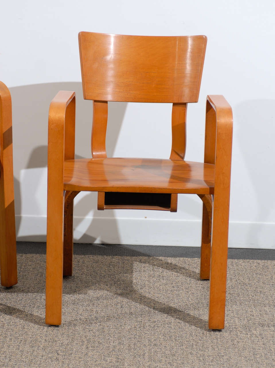 An Unusual Pair of Bent Plywood Arm Chairs by at 1stDibs