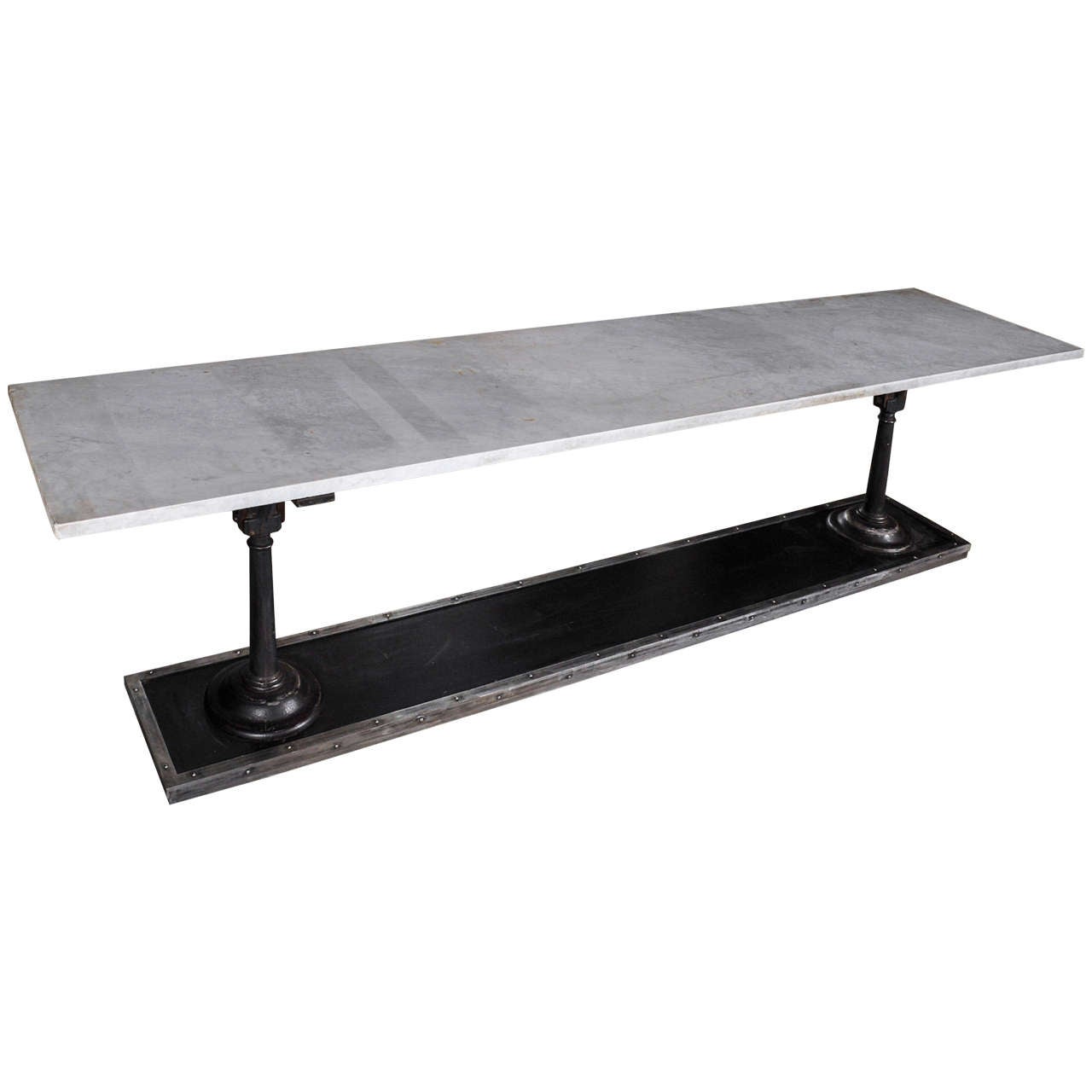 A Long, Slim Cast And Wrought Iron Butchers Table With Carrara Marble Top