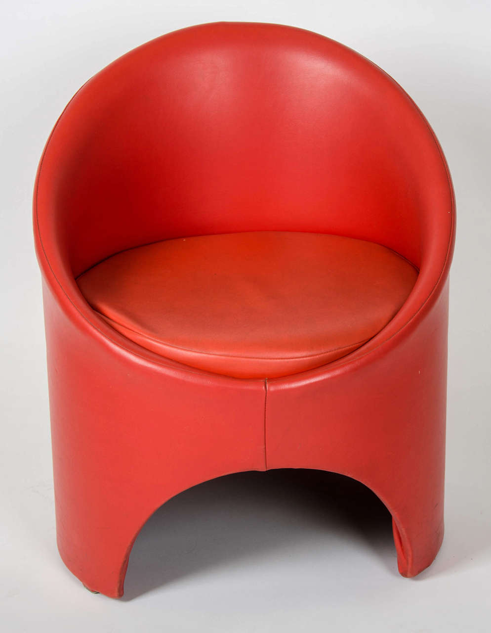 A red leatherette side chair with it's original covering and London Design House documentation enclosed.