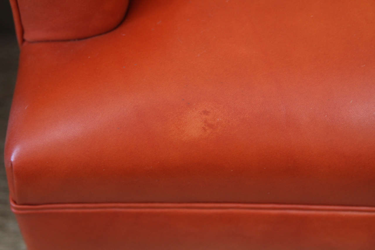 Mid-20th Century Pair of orange Leather Mid-Century Armchairs
