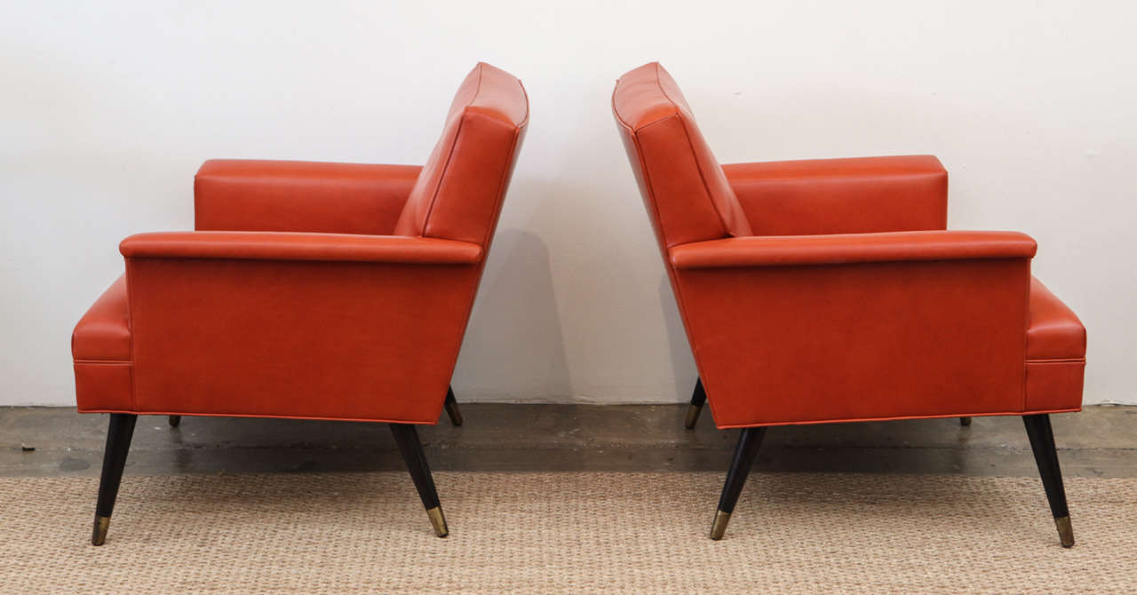 Pair of orange Leather Mid-Century Armchairs 1