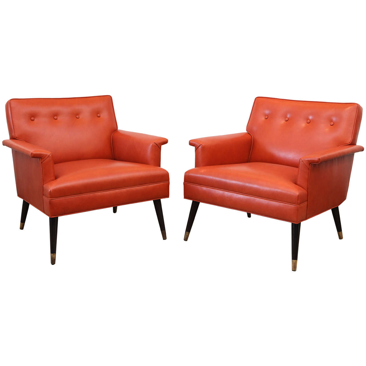 Pair of orange Leather Mid-Century Armchairs