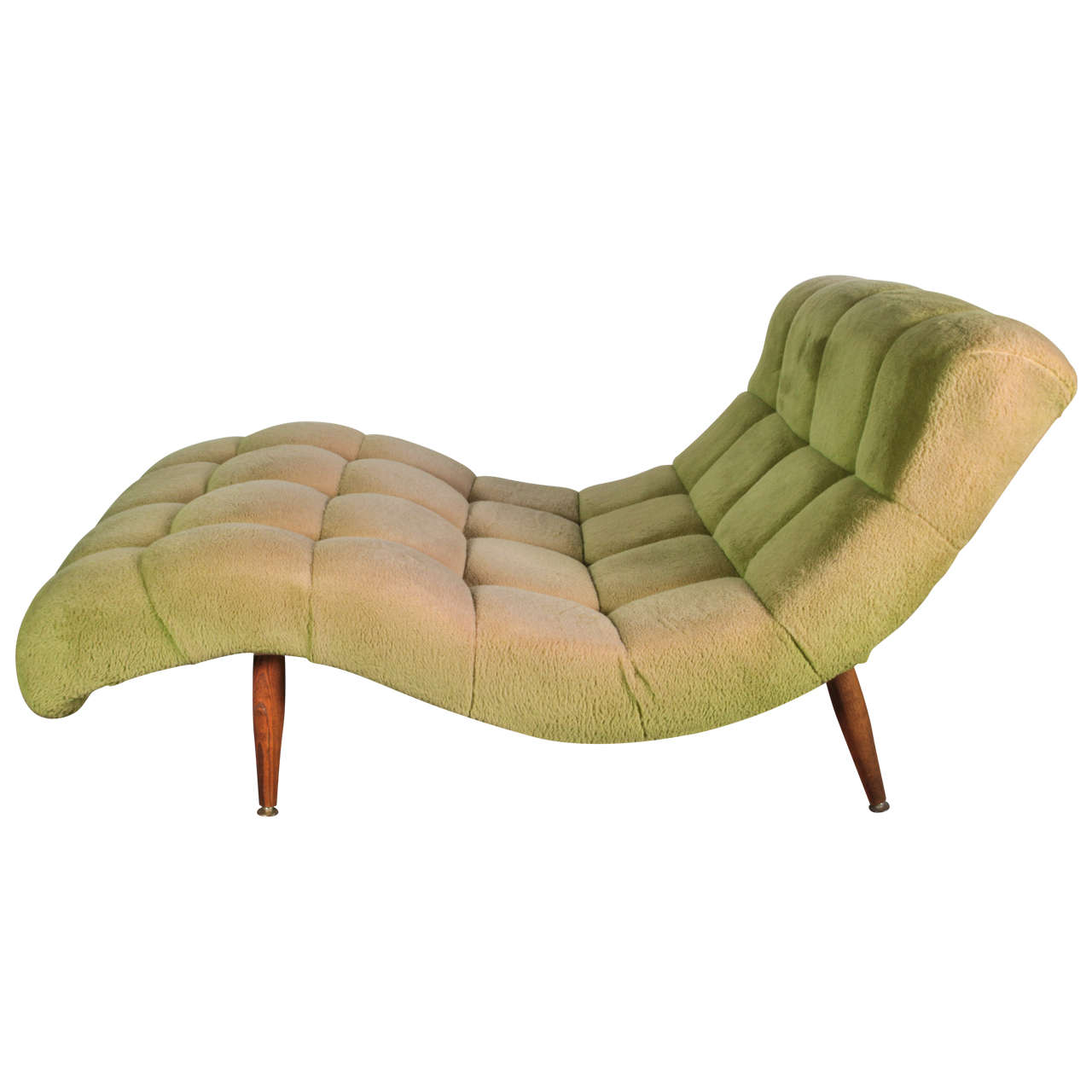 A Mid Century modern wave design loveseat / recamier in original high pile  pistachio color faux fur- attributed to Adrian Pearsall.
The tapered legs are oak and have functional levelers at the base for varied floor types. The seating is very