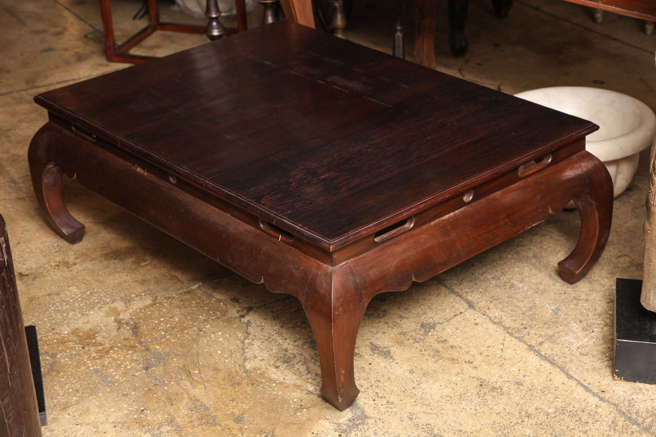 A Kang style low (coffee) table with C-form legs, from Cambodia.