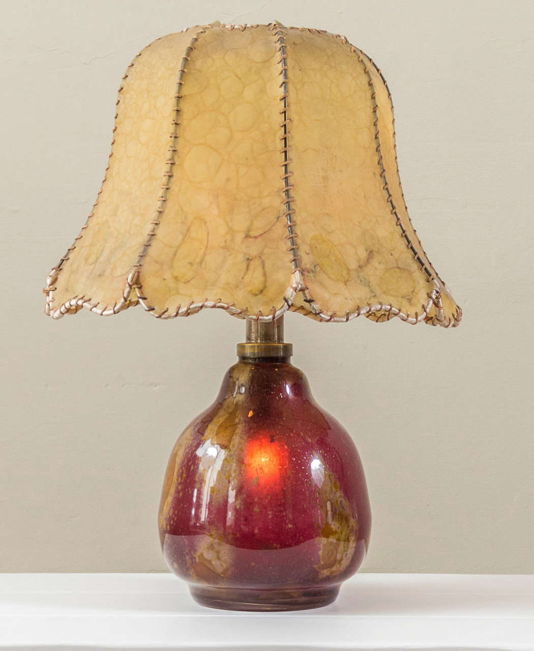 A silver plate mounted WMF, WURTTEMBERGISCHE METALLWARENFABRIK German art glass lamp with parchment shade