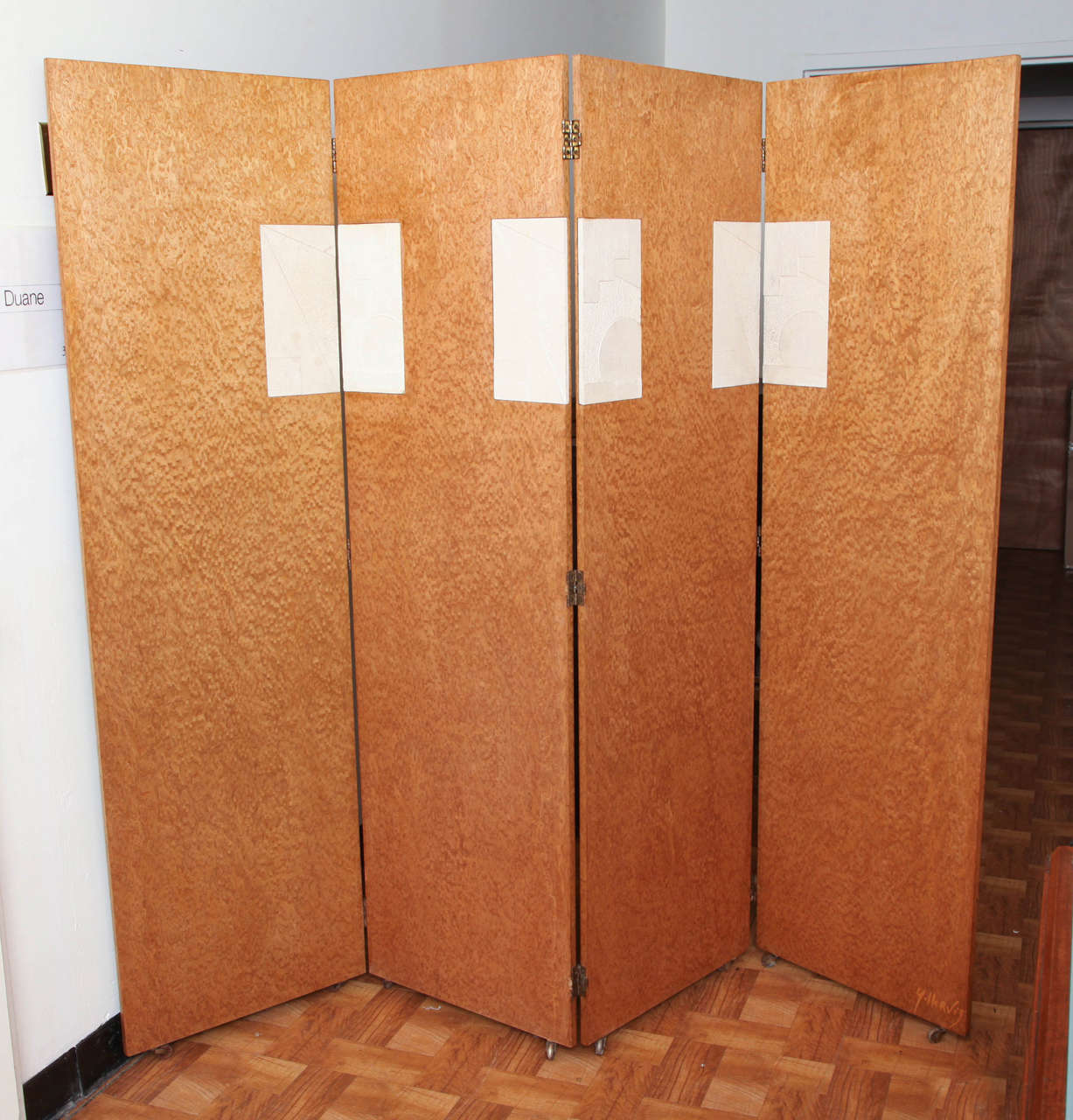 Four-panel burl sycamore screen with plaster insets by Yves Hervis.