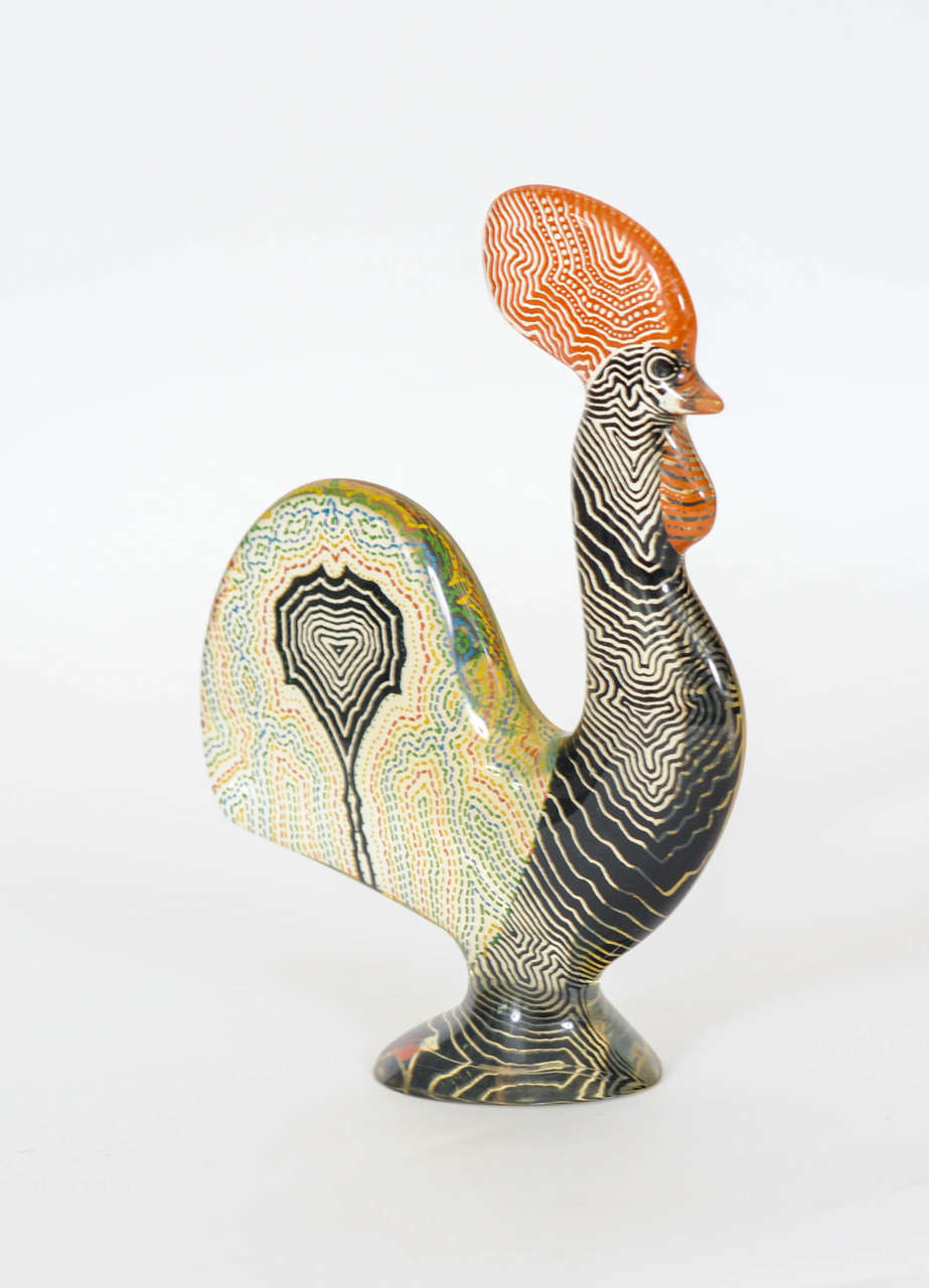 This marvelously tall rooster has a beautiful polychrome pattern and will be an eye-catcher in any interior. Signed 