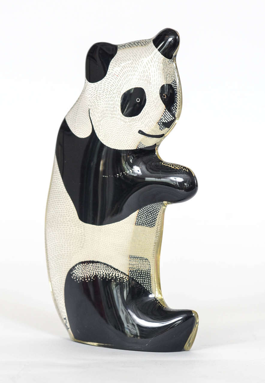 Charming panda made by Abraham Palatnik.

The Brazilian artist Abraham Palatnik (1928) was the founder of the technological movement in Brazilian art, and a pioneer in making kinetic sculptures. 
In the late 40th (1949) he created his first