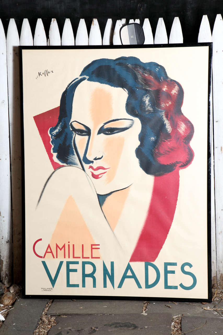 A wonderful large framed poster of Camille Vernades. Black plastic frame with plexiglass.