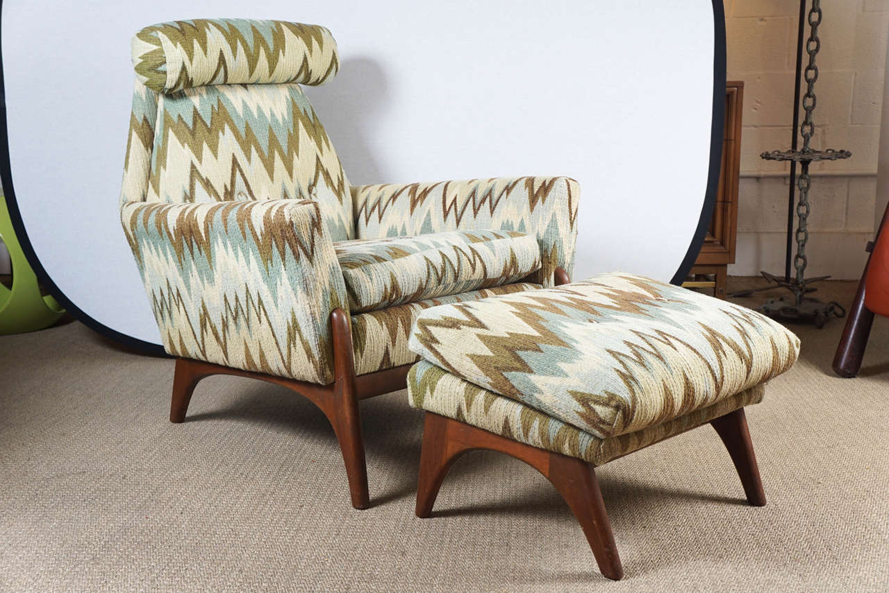 Here is a great chair and ottoman in a flame stitch fabric by Adrian Pearsall.
The chair and ottoman are in great condition with vintage wear on the fabric.