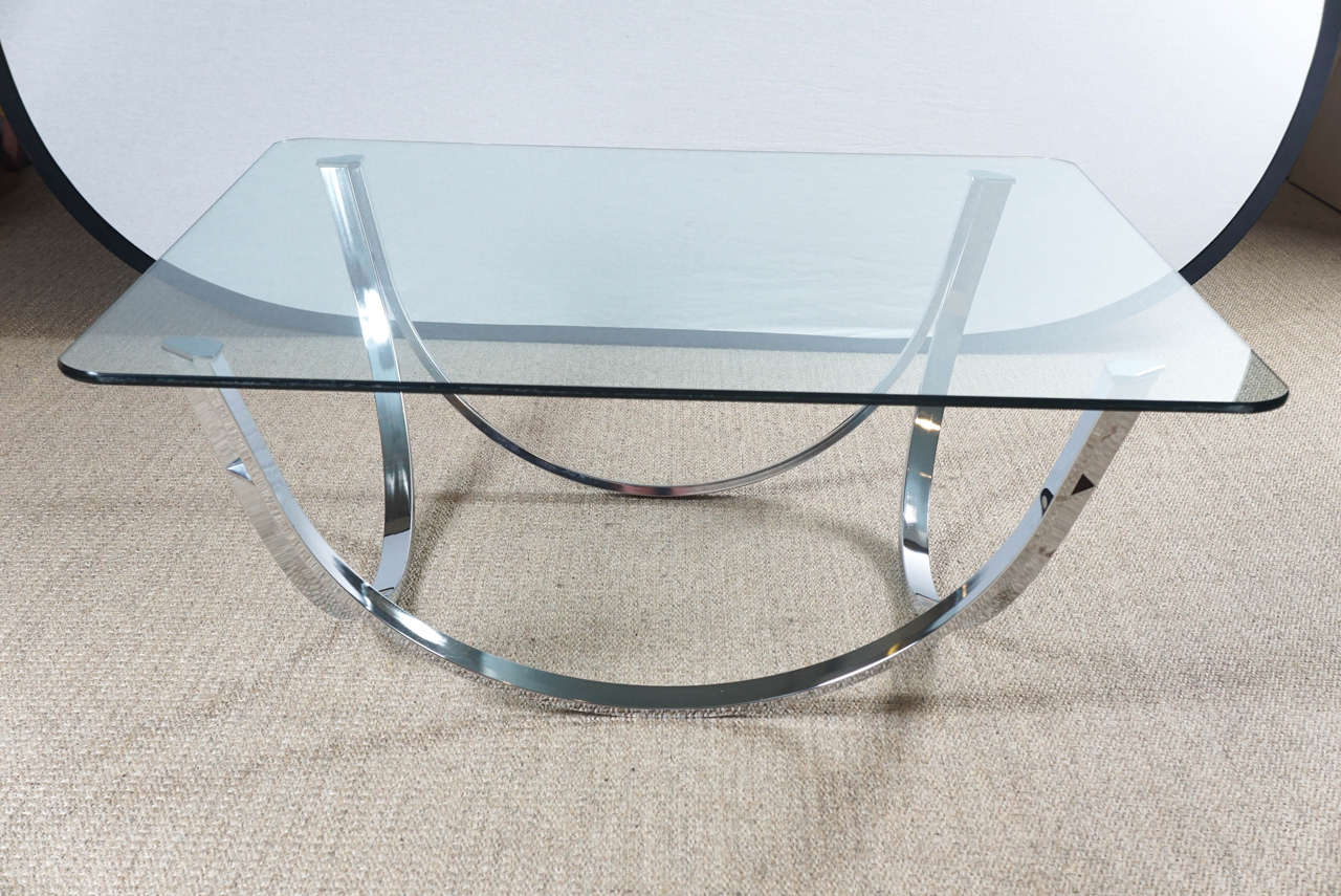 Here is a great chrome coffee table base with a reversible double arch motif.