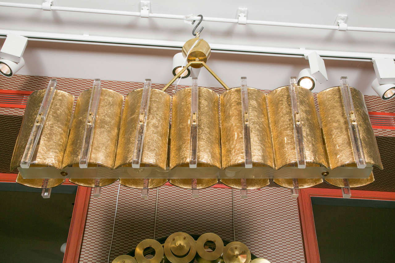 Gilt Murano glass chandelier, brass structure, 14 bulbs.