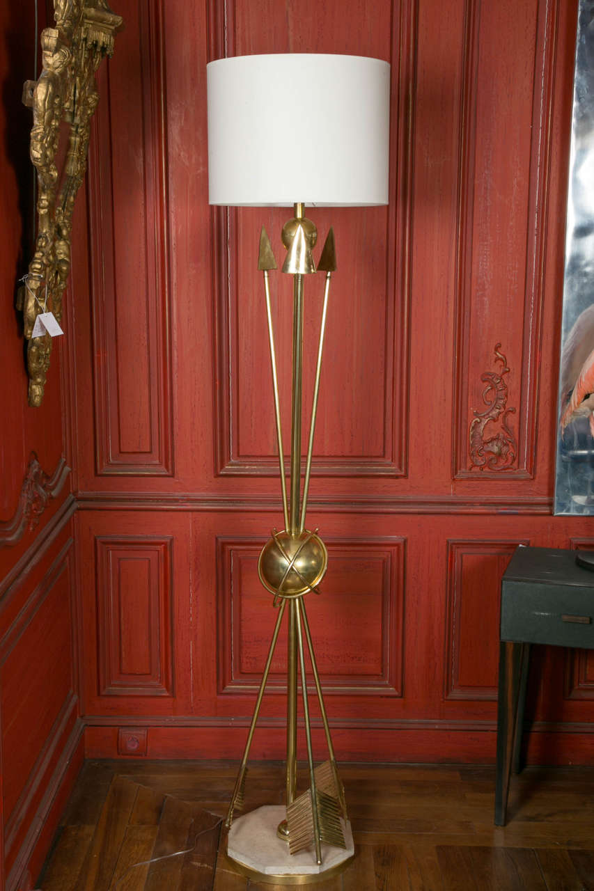 Pair of arrow floor lamps, basement in stone and brass