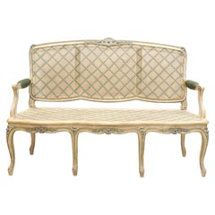 Early 20th Century Louis XV Style Finely Carved Wood and Caned Settee