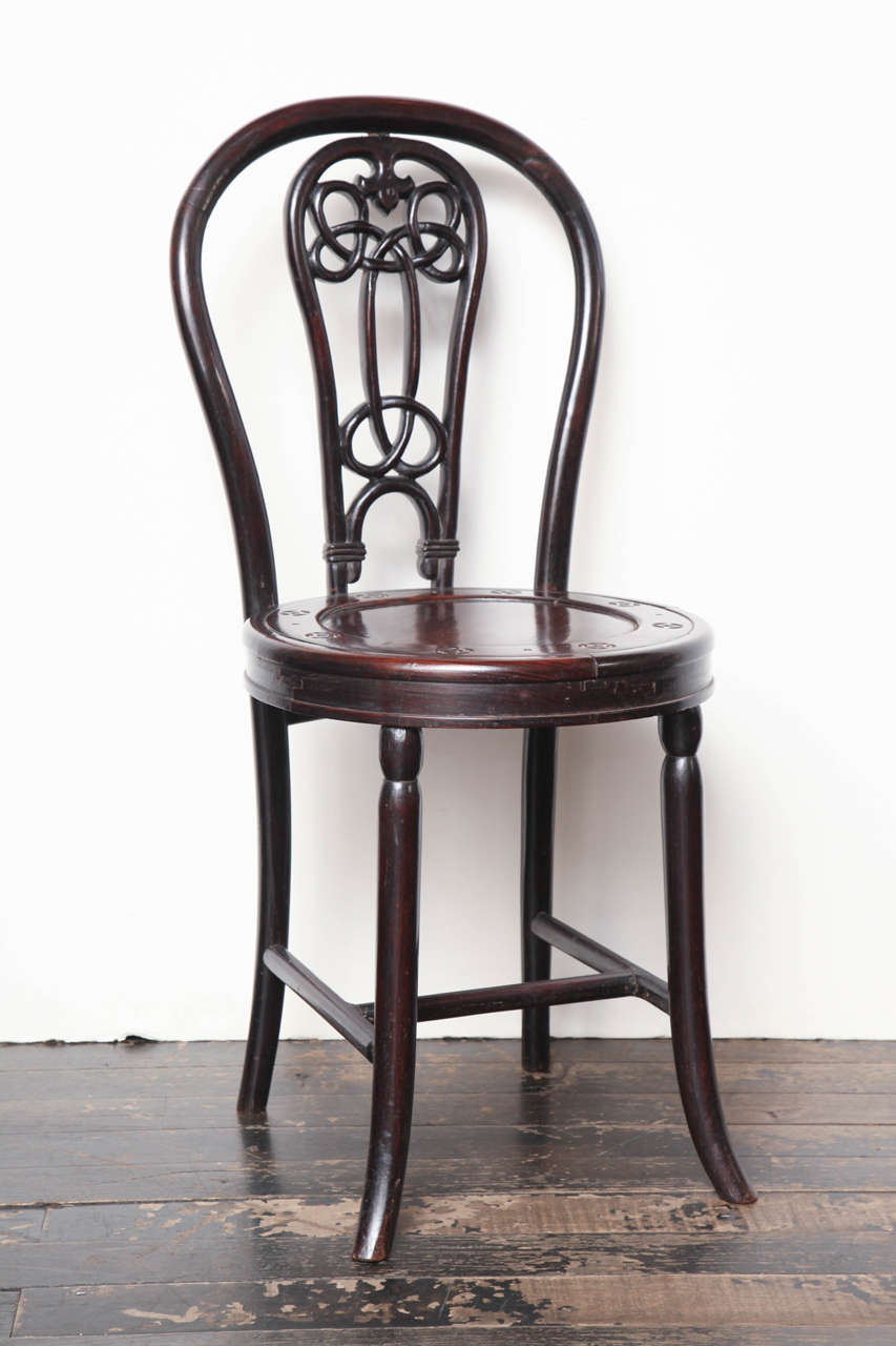 19th Century Chinese Hardwood Chair With Carved Back and Solid Seat