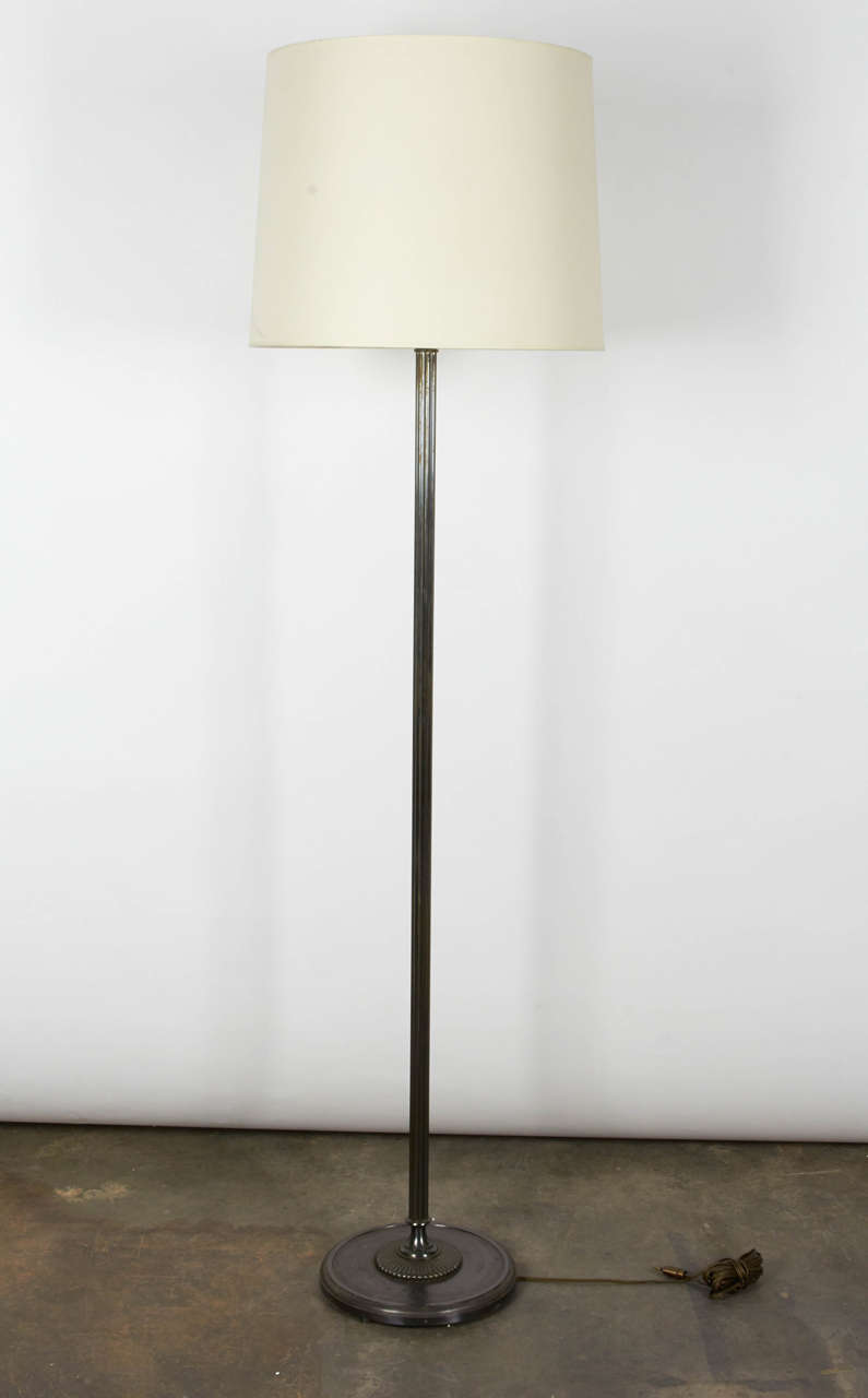 Bronze floor lamps with Industrial feel and elongated modern body. Click switches at lamp head add unique Old World vibes. The antique lamps are wired for European outlets and bulbs (France). 

Not available for sale or to ship in the state of