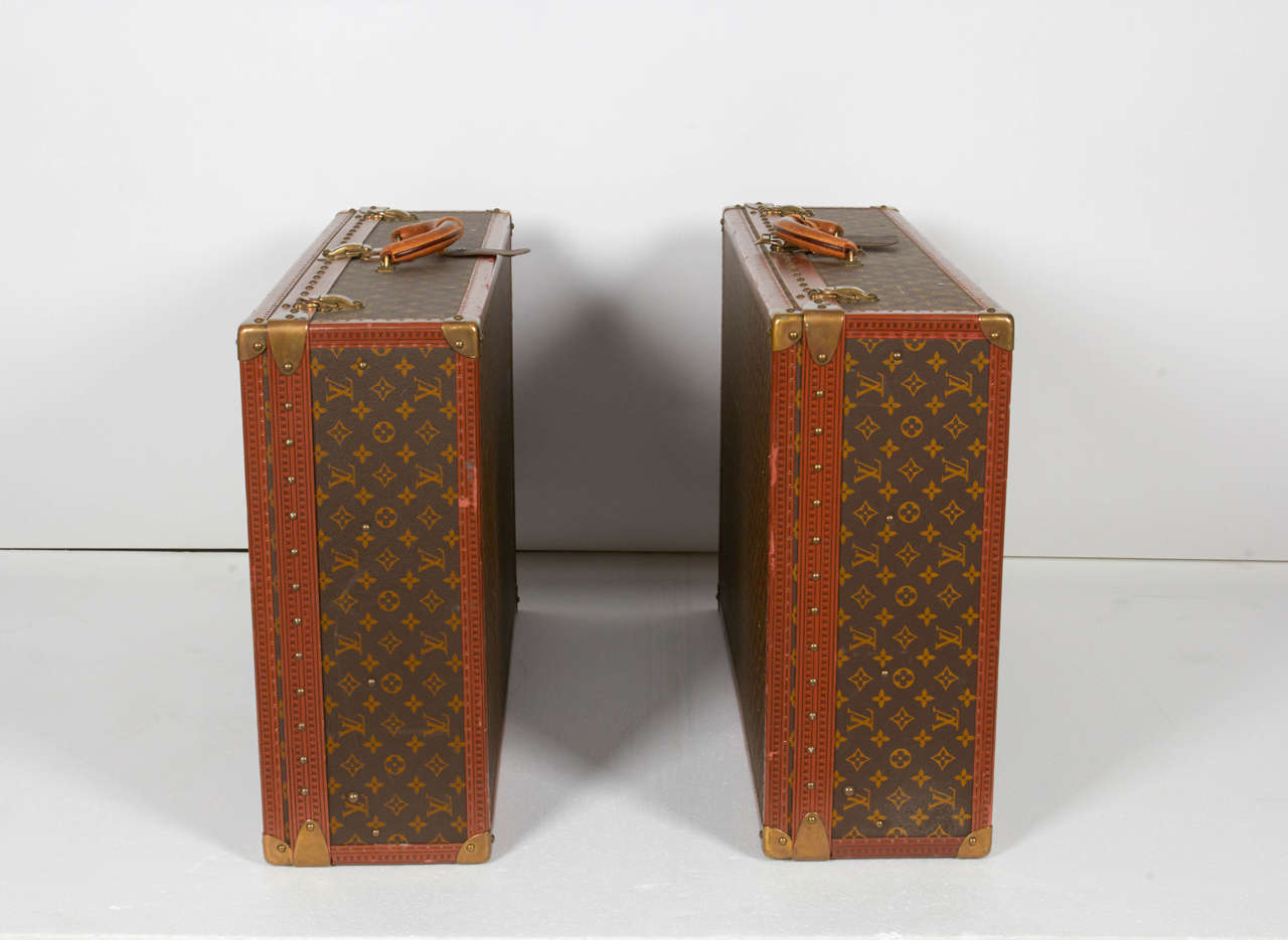 French Pair of Vintage Louis Vuitton Alzer Suitcase Trunks