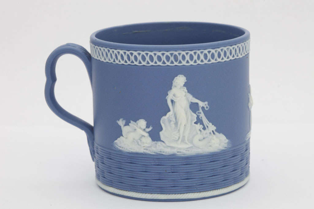 A rare unmarked Neale & Co blue and white jasper child's mug decorated with classical figures over a basket weave design