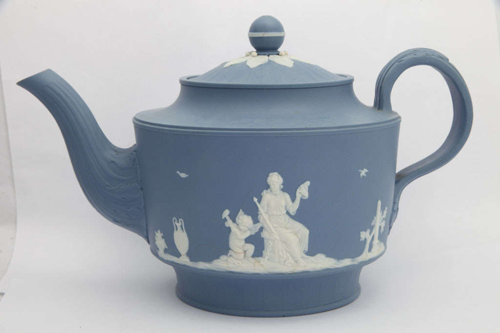 A rare signed Neale & Co blue and white jasper teapot with classical figures