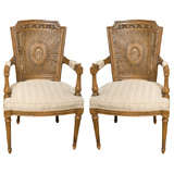 Pair of Louis XVI Style Fruitwood & Cane Fauteuil Chairs