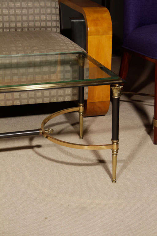 Coffee table with glass top by Maison Jansen