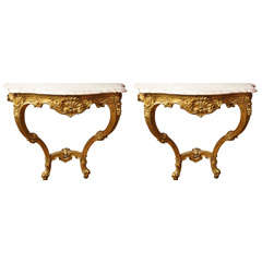 A pair of French Louis XV style wall mounted console tables at 1stDibs