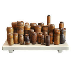 Collection Of Timor Tobacco Containers On Lacquer Stand
