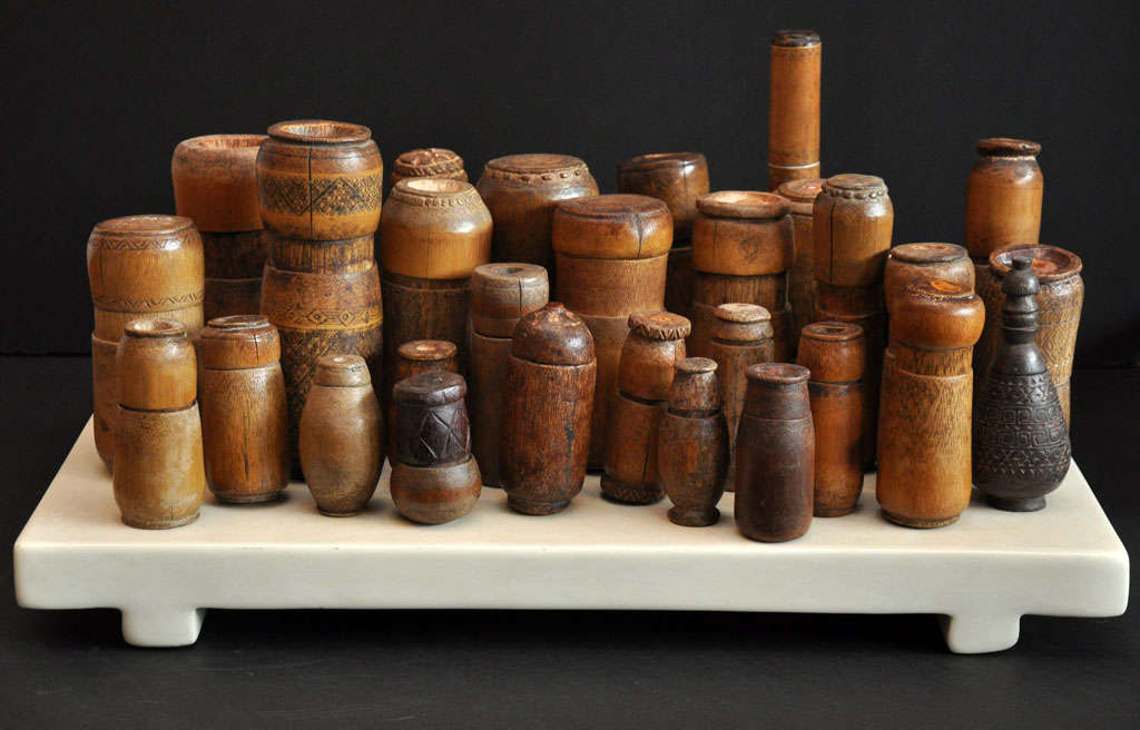 Collection Of Timor Tobacco Containers On Lacquer Stand at 1stdibs