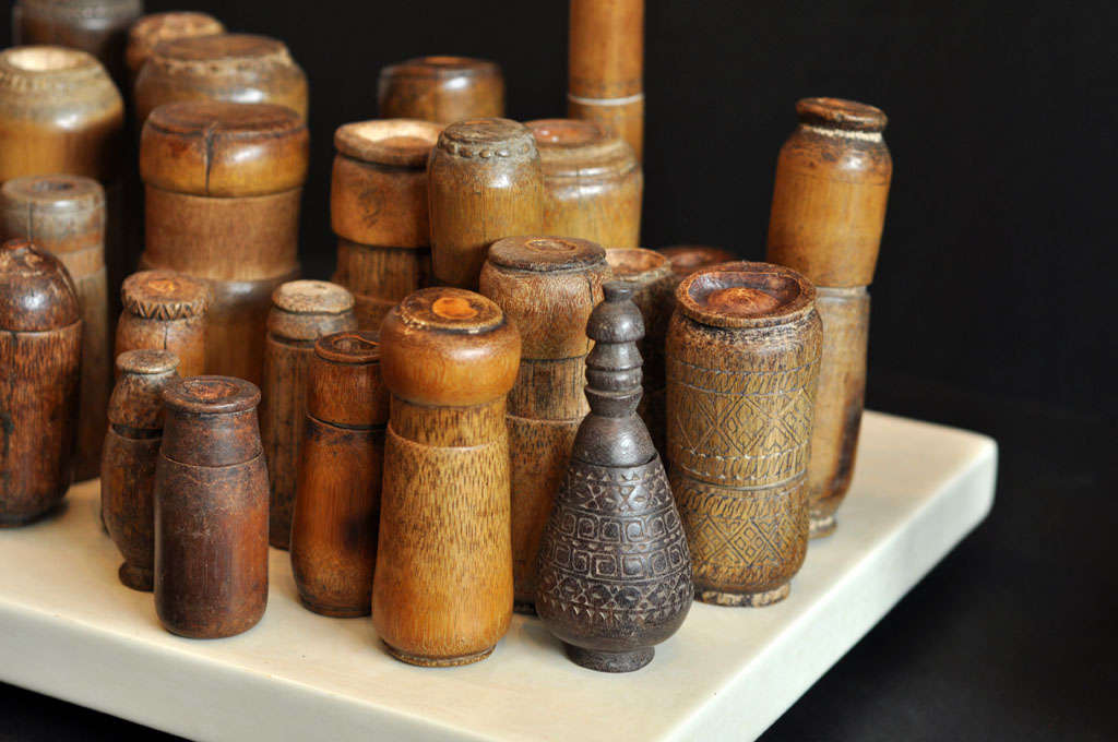 Collection Of Timor Tobacco Containers On Lacquer Stand at 1stdibs