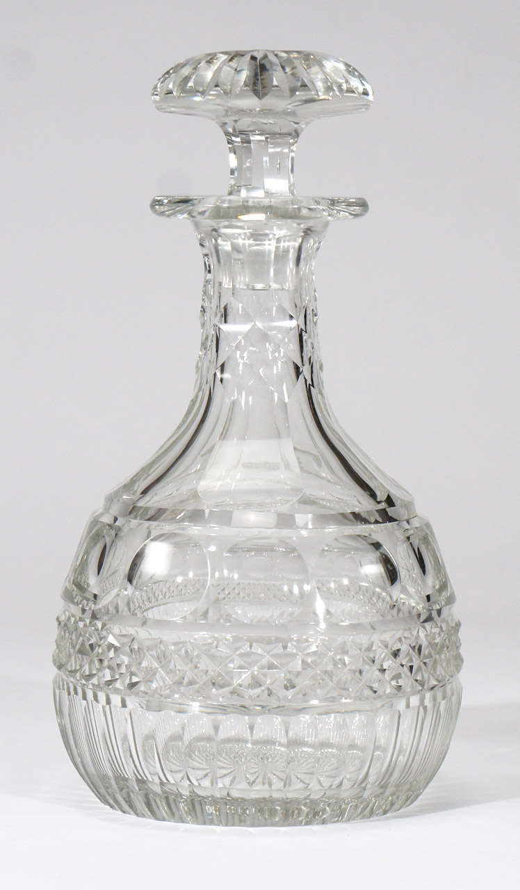 This elegant, handblown clear crystal decanter is one of the elusive magnum size, ready to be filled for that special wine with those special friends. The base is ray-cut to match the stopper and the many faceted patterns include diamond points,