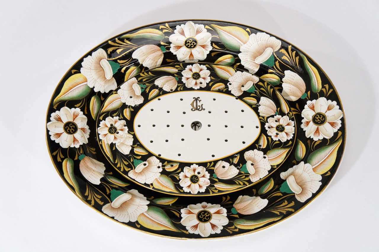 The bold decoration and color combination of this Ashworth Ironstone large platter evokes both the 